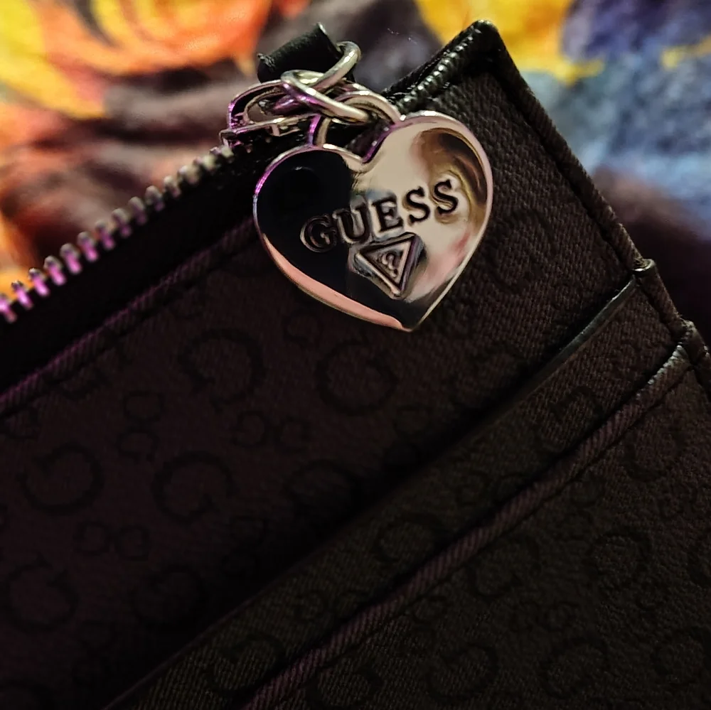 GUESS Black Embossed Wristlet - Picture 2 of 6